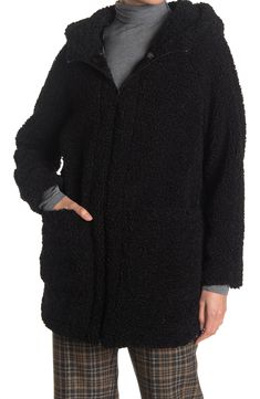 Stay warm in this soft, midweight faux shearling parka featuring an attached hood and patch pockets for cozy-chic style. 33.25" length Attached hood Funnel neck Long sleeves Front zip closure Front patch pockets Faux shearling construction Lined Curved high/low hem Faux shearling shell: 100% polyester/lining: 100% polyester Dry clean Imported Model’s stats for sizing: 5’10” height, 34” bust, 24” waist, 35” hips. Black Sherpa Outerwear, Casual Black Fur Coat With Faux Fur Lining, Cozy Black Outerwear With Faux Fur Trim, Casual Black Fur Coat For Cold Weather, Hooded Sherpa Outerwear With Faux Fur Trim, Black Fur Coat With Pockets For Fall, Hooded Faux Fur Outerwear With Pockets, Black Hooded Sherpa Fleece Jacket, Casual Hooded Fur Coat With Faux Fur Trim