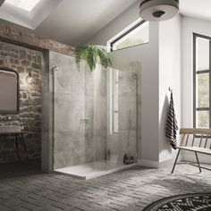 a bathroom with a walk in shower next to a chair