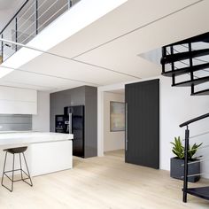 the kitchen is clean and ready to be used as a dining room or living room