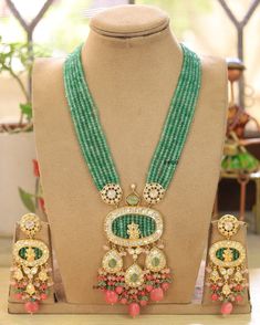 Sabyasachi inspired Kundan Polki necklace of Beads with matching earrings Perfect for any kind of occasions and ceremonies. You can wear it with Saree lehenga and Evening Gowns. Highest quality and craftsmanship. Arrives in box Please let me know if you have any questions Temple Jewelry Sets With Dangling Beads For Wedding, Traditional Polished Beads Earrings For Wedding, Traditional Necklaces With Latkans For Reception, Wedding Beaded Necklace With Latkans For Diwali, Traditional Kundan Necklace With Dangling Beads For Celebration, Traditional Beaded Earrings For Reception, Temple Jewelry Bridal Necklace With Polished Beads For Wedding, Wedding Jewelry Sets With Dangling Beads For Festivals, Diwali Wedding Bridal Necklace With Polished Beads