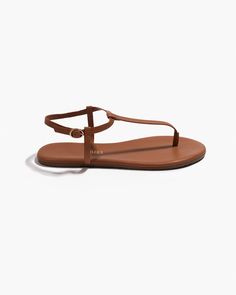 True minimalist form.Classic T-strap silhouette with a minimal ankle band and buckle. Hand made in Brazil with our premium soft leather, and cushioned insole so you can skip the break-in period. Classic T-strap Sandals With Buckle Closure, Classic T-strap Sandals With Ankle Strap, Modern T-strap Sandals With Leather Footbed, Leather T-strap Sandals For Everyday, Everyday Leather T-strap Sandals, Everyday Leather T-strap Adjustable Sandals, Everyday Leather T-strap Sandals With Single Toe Strap, Leather T-strap Sandals With Single Toe Strap For Everyday, Leather T-strap Sandals With Single Toe Strap