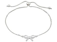 Sterling Silver Bow Bolo Bracelet. Measures approximately 5/16 of an inch in width and has an adjustable slide closure. Casual Silver Adjustable Chain Bracelet, Trendy Silver Jewelry With Sliding Knot, Casual Adjustable Chain Bracelet, Trendy Silver Bracelet With Sliding Knot, Trendy Silver Adjustable Bracelet, Elegant Silver Bracelet With Sliding Knot, Formal Adjustable Nickel-free Chain Bracelet, Silver Charm Bracelet With Adjustable Length, Silver Bracelets With Adjustable Clasp