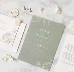 the wedding stationery is laid out and ready to be put into their guests'names