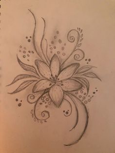 a pencil drawing of a flower with swirls and bubbles on it's petals