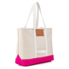 This versatile pink tote is perfect for everyday use as well as for travel & features dual straps, an open top, and Italian vegetable tanned leather accents It's extremely durable since it's made from a thick, natural canvas which is then coated in a waster-resistant finish. The bottom of the bag is also protected additionally with nylon Measures 15" x 13" x 5" *Custom monogram is ink stamped in gold. As an FYI, there's a max. 2 letter count **Please allow 3 weeks lead time since it's made-to or Pink Weekender Bag With Removable Pouch, Functional Pink Leather Bags, Canvas Weekender Bag With Canvas Lining For Shopping, Pink Large Capacity Weekender Bag With Double Handle, Rectangular Canvas Weekender Bag With Canvas Lining, Pink Everyday Bag With Reinforced Handles, Pink Tote Weekender Bag For Daily Use, Pink Weekender Bag With Double Handle, Pink Double Handle Weekender Bag For Everyday Use