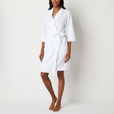 Step out of bed and wrap yourself the warmth of this women's robe from Liz Claiborne. It's made from soft waffle-knit with a shawl collar, long sleeves, a self-tie waist, and side slip pockets. Closure Type: TiePockets: 2 Side Slip PocketsSleeve Length: 3/4 SleeveApparel Length: 40 InchesFiber Content: 100% PolyesterFabric Description: WaffleLining: UnlinedRobe Length: Knee LengthCollar: Shawl CollarCare: Tumble Dry, Machine WashCountry of Origin: Imported Women's Robe, Shawl Collar, Waffle Knit, Liz Claiborne, Long Length, Women Long Sleeve, Knee Length, Long Sleeves, Long Sleeve