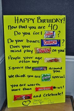 a yellow sign with candy bars on it that says happy birthday do you feel 40?