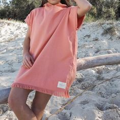 A Seaside Essential, Our Beach Ponchos Are A Must-Have For Your Little Beach People All Year Round. Designed For Tweens Aged 7-12, Made From Soft, Lightweight Cotton With A Handy Oversized Hood And Our Signature Eyelash Fringing. Color Coral. 100% Cotton With Eyelash Fringe Detail Terry Underneath For Drying Lightweight Construction (270 Gsm) Oversized Hood To Keep Your Head Warm Internal Pockets Easy Pullover Hoodie Style 76 X 66cm Designed In Australia For Best Care, Machine-Wash Cold With Lik Casual Pink Poncho, Pink Casual Loungewear Cover-up, Short Sleeve Beachwear Cover-up For Warm Weather, Casual Beach Poncho In Relaxed Fit, Casual Beach Poncho With Relaxed Fit, Casual Short Sleeve Cover-up For Warm Weather, Relaxed Fit Poncho For Beach And Summer, Relaxed Fit Poncho For Beach In Summer, Summer Beach Poncho In Relaxed Fit