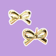 18K Stainless Steel Tarnish-Free Bow Stud Earrings, these earrings feature adorable bow designs meticulously crafted from high-quality stainless steel with a radiant 18K gold finish. Their tarnish-free properties ensure they retain their brilliance over time, while the classic stud style offers timeless appeal. Gold Earrings With Decorative Bow As Gift, Gold Earrings With Decorative Bow For Formal Occasions, Formal Gold Earrings With Decorative Bow, Gold Earrings With Bow Tie Detail For Gift, Gold Bow Tie Earrings For Gift, Classic Gold Bow Earrings, Elegant Gold Earrings With Decorative Bow, Elegant Gold Earrings With Bow Tie Detail, Bow Designs