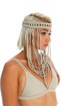 DESCRIPTION Oracle Dawn Headpiece. A dreamy festival headpiece. Hand-crafted macrame embellished with silver beads and chain. This stunning headpiece comes with the added feel-good factor of being a Ladee Taha zero waste treasure. - Fabric: Recycled ECONYL® nylon lycra. - Hand-crafted macrame. - Silver hardware. SIZE GUIDE: 1 size fits all with adjustable stretchy ties. Styled with our Ocean triangle bralette | Dreamers top | Dreamers mini skirt | Mella crochet dress. SHOP ALL: Ladee Taha treasu Burning Man Fashion Woman, Macrame Crown, Macrame Veil, Macrame Fashion, Macrame Hat, Nomad Fashion, Macrame Headband, Rope Dress, Fashion Costume Halloween