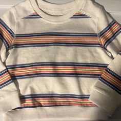 Baby B’gosh Oshkosh, 24 Month, Adorable Crew Neck Sweatshirt, No Tags But It Was Never Worn, Cream Color With Stripes Playtime Soft-washed White Tops, Cute White Soft-washed Tops, Cute Soft-washed White Tops, Playful White Cotton Sweatshirt, White Long Sleeve T-shirt For Playtime, White Sweatshirt For Fall Play, White Sweatshirt For Playwear In Fall, White Fall Sweatshirt For Play, White Fall Sweatshirt For Playwear