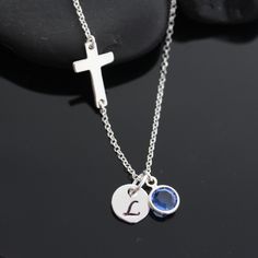 "Initials and/or birthstones, at checkout please. SIDEWAYS CROSS Sterling silver. This is such a basically design, it look exactly the same as Miley Cyrus you don't have to pay $400 for it. LIKE THIS ITEM? Save it and revisit it later There's the Facebook and Pinterest button, to Add it to your favorites Or you can E-mail it! SEE MORE GREAT UNIQUE SIDEWAYS CROSS DESIGNS: http://etsy.me/13EPMGa add your personal touch to this necklace. Would you like to add more initials, birthstones, meaningful Silver Cross Jewelry With Birthstone, Sterling Silver Initial Necklace With Birthstone For Birthday, Silver Cross Pendant Necklace For Personalized Gift, Minimalist Sterling Silver Initial Necklace With Birthstone, Sterling Silver Birthday Initial Necklace With Birthstone, Sterling Silver Initial Pendant For Birthday, Silver Initial Pendant Name Necklace With Birthstone, Sterling Silver Initial Necklace With Birthstone For Anniversary, Sterling Silver Cross Necklace With Birthstone