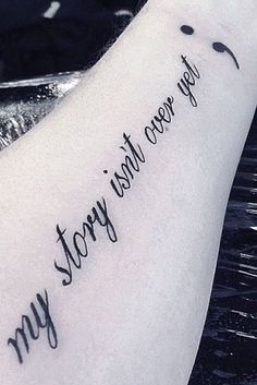 a person with a tattoo on their arm that says stay strong, never let go