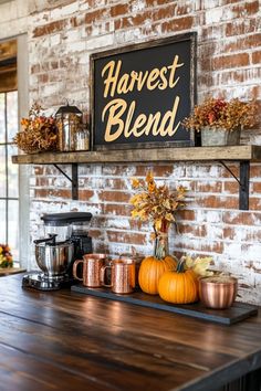 a sign that says harvest blend on the side of a brick wall above a wooden table