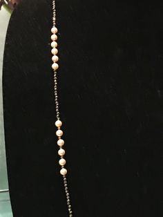 "This piece was designed to copy an actual necklace worn by Lady Mary in the PBS series Downton Abbey. This necklace is 50\" of glittering faceted gold natural iron pyrite beads interspersed with mint condition 6mm vintage cream faux Majorca pearls OR genuine AAA freshwater pearls (choose when you checkout). This is a VERY long necklace; it measures 50\" total from top to bottom. It can be worn as one long necklace (if you're tall or channeling your inner flapper) but it's also meant to be loope Formal Costume Jewelry Beaded Round Necklaces, Vintage Single Strand Necklace For Evening, Formal Costume Jewelry Beaded Necklaces, Vintage Long Necklace For Evening, Formal Round Beaded Necklaces Costume Jewelry, Formal Round Beaded Necklaces In Costume Jewelry Style, Adjustable Formal Pearl Necklace, Classic Evening Necklace With 17 Jewels, Classic Single Strand Pearl Necklace For Evening