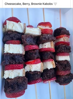 strawberries and chocolate brownies on skewers with marshmallows