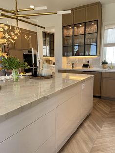 the kitchen is clean and ready to be used for cooking or baking, with marble counter tops