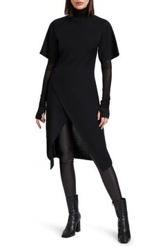 This ultrachic tunic is crafted from fine merino wool and makes a striking silhouette whether worn solo or as a layering base. Turtleneck Long sleeves with thumbhole cuffs High-low hem 100% merino wool Imported Elegant V-neck Tunic For Fall, Elegant Fall V-neck Tunic, Chic Fall Tunic For Workwear, Chic Fitted Tunic For Fall, Fitted Long Sleeve Tunic For Work, Elegant Fitted Tunic For Workwear, Chic Fitted Long Sleeve Tunic, Fitted V-neck Elegant Tunic, Elegant Fitted Long Sleeve Tunic