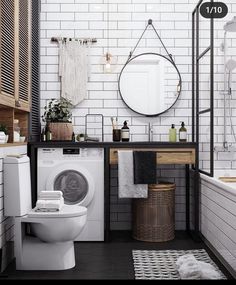 a washer and dryer in a small bathroom