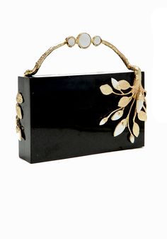 Designed by our designer for her own wedding, the Brancuse is one of our most ambitious designs. Something truly special for you or someone you adore. Hand casted Brass with 14k Gold Foil. Black Polish Shell , Mother of Pearl Inlay. Magnetic Closure with Matte Satin Lining. Detachable 44" chain. Measurements: 180mm x 110mm x 50mm Free Domestic Shipping on this item. Luxury Formal Box Bag With Removable Pouch, Luxury Elegant Handmade Box Bag, Luxury Hand-embellished Clutch Bags, Chic Hand-embellished Clutch Bag, Glamorous Gold Hand-embellished Evening Bag, Designer Black Evening Bag With Gold-tone Hardware, Luxury Black Evening Bag With Gold-tone Hardware, Satin Clutch, Random Products