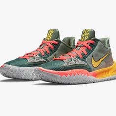 the nike zoom basketball shoe is shown in green, yellow and orange colors with an upper part