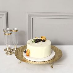 PRICES MAY VARY. Round Pedestal Dessert Display Stand
Add a touch of elegance to your next party or get-together with this Metal Pedestal Cake Dessert Stand. Featuring a beautiful floral design, this stand is perfect for displaying your favorite cakes or other desserts. The hairpin legs add a modern touch, while the overall design makes this stand ideal for both formal and casual occasions.


Party Cake Stand With Gold Rim
This stand is adorned with gold rim borders and gold hairpin legs, giving Glass Cupcake Stand, Appetizer Display, Dessert Display Stand, Cupcake Stand Wedding, Cake And Cupcake Stand, Metal Serving Trays, Serving Tray Decor, 1 Cake, Dessert Stand