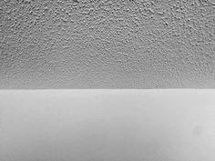 a black and white photo of the ceiling