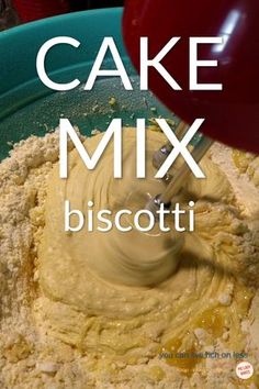 a mixing bowl filled with cake mix and the words biscotti