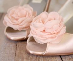 "Dress up your trip down the aisle with these lovely blush peep toe wedges! These 2 1/2\" bridal heels (measured like this: http://www.customweddingshoe.com/how-heel-height-is-measured.html) are done in blush satin with a handmade flower in layers of organza and satin. Color Change: Want this shoe in a different color? We can change the base shoe color for you! To order this shoe in a different color, please send us a CUSTOM REQUEST. To view our catalogue of colors, please visit our website at: Pink Closed Toe Wedding Shoes, Elegant Pink Wedding Shoes For Bridal Shower, Blush High Heels For Wedding, Elegant Blush Wedding Heels, Elegant Blush Heels For Wedding, Blush Feminine Heels For Wedding, Spring Wedding Pink Shoes, Spring Pink Wedding Shoes, Pink Open Toe Heels For Wedding