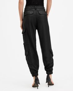 They look like leather but are made from super-soft fabric – the Himari Cargos are different. Cut to a relaxed fit with an elasticated hem, the classic shape features multiple pockets for an easy look that can be dressed up or down.  These pants are designed to a relaxed fit Mid-rise Coated fabric Button closure with zipper fly Welt back pockets Elasticated hem Tapered cuffed leg