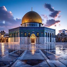 the dome of the rock is lit up at night with bright clouds in the background