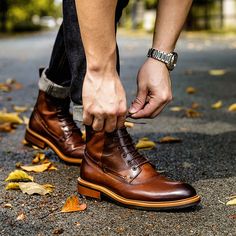 Men's English Boots The upper, fashioned out of sturdy full-grain leather, is detailed with impressive ornamentation. Every hole of the broguing is precise, the placement of the swooping wingtip and pinking is exact. Fine points which really shine on these boots which exemplify how well form can meet function. Stylish Men's Leather Boots It’s worth the effort to create a handsome and timeless boot you can wear with suits, chinos and cool jeans. Stitched soles are the mark of quality footwear. Wi Casual Leather Boots, Timeless Boots, Brogues Style, Luxury Boots, Popular Boots, Genuine Leather Boots, Mens Leather Boots, British Men, Martin Boots