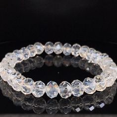 a bracelet made out of clear glass beads