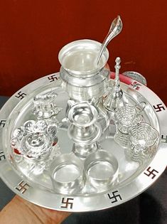 "Style 1 red velvet bag  silver plated pooja thali set  15 pc set  thali size 10\" style 2  red velvet bag  sliver plated puja thali set thali size 8.5 \" set of 8pc  style 3  red velvet bag  silver plated puja thali set  thali size 9.5\" set of 10 pc" Puja Thali, Size 10 Style, Pooja Thali, Temple Decor, Rings Ceremony, Bag Silver, Diwali Gifts, Welcome Gifts, Festival Wedding