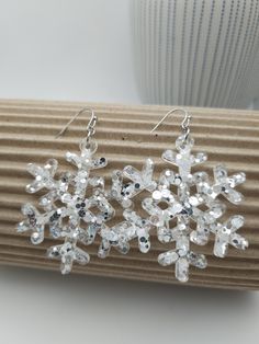 . Winter Party Dangle Jewelry, Holiday Winter Drop Earrings, Winter Holiday Drop Earrings, Winter Festive Dangle Earrings, Festive White Earrings For Winter, White Festive Earrings For Winter, White Winter Party Jewelry, Silver Earrings For Holiday Parties, Holiday Silver Drop Earrings