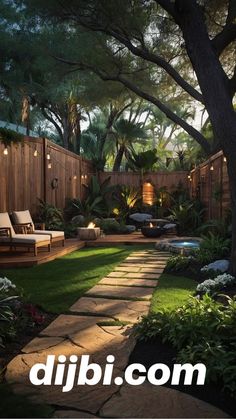 a backyard with grass, trees and lights