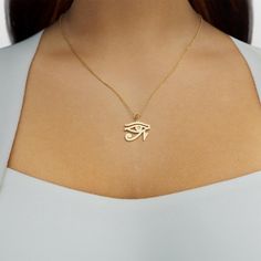 Our Plain Eye of Horus (Ra) Necklace is a simple yet elegant piece of jewelry. Available in either solid gold or sterling silver, this necklace features the iconic Eye of Horus symbol. The Eye of Horus symbolizes protection, healing, and wisdom, and has been revered in ancient Egyptian culture for centuries. With its timeless design and powerful symbolism, this necklace is perfect for everyday wear or special occasions. Add it to your collection today and channel the power of the Eye of Horus! Spiritual 14k Gold Initial Pendant Jewelry, 14k Gold Spiritual Initial Pendant Jewelry, Symbolic 14k Rose Gold Necklace, Symbolic White Gold Tarnish-resistant Necklace, Symbolic Rose Gold Pendant Jewelry, Rose Gold Symbolic Pendant Jewelry, Symbolic Rose Gold Tarnish-resistant Necklaces, Symbolic Rose Gold Tarnish Resistant Necklace, Symbolic Rose Gold Tarnish-resistant Necklace