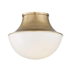 a light fixture with a white glass shade on the bottom and gold trimmings