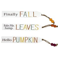 three wooden name tags with pumpkins and words that say fall, leaves, hello pumpkin