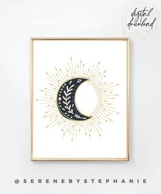 a white wall with a black and gold moon on it's side, in front of the words serene by stephanie