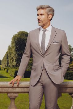 Subtle and sleek. Our Textured Gray collection was designed with spring in mind. Goes great with black or brown shoes. Our soft shade of grey sets the perfect backdrop for any color story. Complete your look with our textured gray vest & flat front pants. Elegant Gray Tuxedo In Suiting Fabric, Elegant Gray Suiting Fabric Tuxedo, Gray Notch Lapel Blazer For Wedding, Gray Notch Lapel Tuxedo For Wedding, Classic Gray Suits For Wedding, Gray Groom's Suit, Elegant Gray Blazer For Wedding, Elegant Gray Wedding Blazer, Elegant Gray Suit For Business Casual