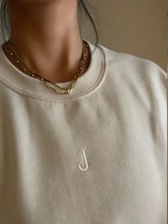 "Initial embroidered sweatshirt. Simple design. Multiple letters allowed (up to 4). For full phrase embroidery, please see our other items! Standard initial size is approximately 2.5cm. If you would like a different size, please let us know. Standard placement is as in the photo (centre upper chest). We can however embroider ANYWHERE on the sweatshirt, including the back neck, lower corners, inside sleeve, left breast etc. Just let us know!  We have dozens more colours of thread and font choices Winter Basic Sweatshirt With Embroidered Logo, Cream Sweatshirt With Embroidered Logo For Winter, White Sweatshirt With Letter Embroidery, White Everyday Sweatshirt With Letter Embroidery, White Sweatshirt With Letter Embroidery For Everyday, White Monogram Cotton Sweatshirt, Embroidered Winter Sweatshirt For Everyday, Everyday Crew Sweatshirt With Letter Embroidery, Winter Monogram Long Sleeve Sweatshirt