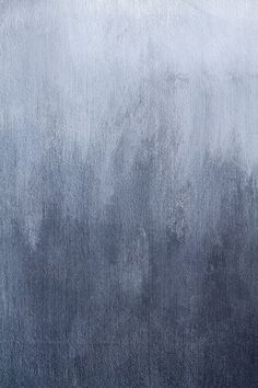 a black and white painting with some gray paint on it's side, as well as the background