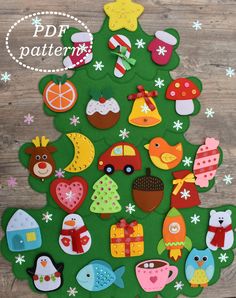 a christmas tree made out of felt with lots of different things on it and the words pdf pattern