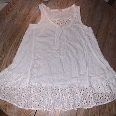 New/Never Worn. (I Have Actually Been Saving This For Years And Just Pulled It Out And Found That It Is Not So Flattering On Me White Cotton 18.5 Pit To Pit 19 Long On Side 28 Long From Top Of Back Neck To Bottom Lace Up Front Crochet With Eyelet Ruffled Hem At Side And Back White Crochet Top With Lace Work, Free People Crochet, Cotton Lace, Ruffle Hem, Free People Tops, White Cotton, New Color, Free People, A Line