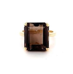 14K Yellow Gold Smoky Topaz Ring Emerald Cut Solitaire Smoky Topaz in a Four Prong Setting. Simply Elegant!  The Smoky Topaz is a beautiful brown color. Stamped:  14 K  ESEMCO Weight:  7 grams Size:  6 1/2 Measurements: Stone measures approx. 14 x 12 mm Shank is approx. 2 mm wide at the bottom. Please shop with care. 15%  restocking fee Another Piece of Beautiful Jewelry From Gold and Silver Jewelry Exchange Please look at pictures carefully.  Item pictured is the item you will receive. We welcome any questions you may have regarding this listing. THANK YOU FOR SHOPPING WITH GOLD & SILVER JEWELRY EXCHANGE PLEASE CHECK OUT OUR EBAY STORE. Mellow Autumn, Emerald Cut Solitaire, Ring Emerald Cut, Gold And Silver Jewelry, Smoky Topaz, Brown Stone, Topaz Jewelry, Ring Emerald, Topaz Ring