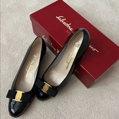 Brand New Vintage Salvatore Ferragamo Lillaz Pumps Black Shiny Leather. Wouldn’t Say It’s Completely Patent But So Sleek. Pristine Shoes And So Comfy With A Little Height. With Classic Ferragamo Bow. Elegant Court Shoes With Rubber Sole, Classic Flat Heel Patent Leather Court Shoes, Formal Patent Leather Court Shoes With Branded Insole, Elegant Closed Toe Court Shoes With Rubber Sole, Formal Court Shoes With Branded Insole And Flat Heel, Elegant Heels With Rubber Sole For Business, Elegant Workwear Heels With Rubber Sole, Classic Patent Leather Heels With Rubber Sole, Designer Patent Leather Court Shoes For Formal Occasions