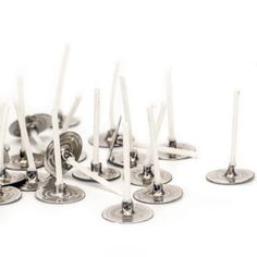 many small candles are placed on top of each other