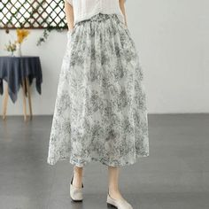 Details: Gender: Women Item Type: Skirt Material: Linen Season: Summer Pattern: Print Style: Casual, Loose, Retro Waist Type: Elastic Waist Size: One Size Waist: 70.00 - 114.00 cm/ 27.56 - 44.88 " Length: 82.00 cm/ 32.28 " Hip: 156.00 cm/ 61.42 " Hem: 204.00 cm/ 80.31 " Casual Spring Full Skirt Bottoms, Non-stretch Gathered Maxi Skirt For Spring, Non-stretch Gathered Skirt For Spring, Spring Long Gathered Skirt, Non-stretch Cotton Skirt With Floral Print, White Floral Print Long Skirt, Casual Full Skirt For Spring, Non-stretch Floral Print Midi Skirt, Tiered Skirt With Pockets For Spring