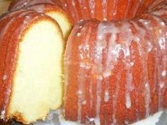 a bundt cake with icing sitting on top of a table